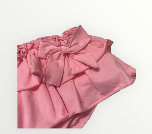 Comprar conjunto de algodón con falda cubre pañal en color rosa. Detalle moña. Marca petit cie. Temporada primavera-verano.