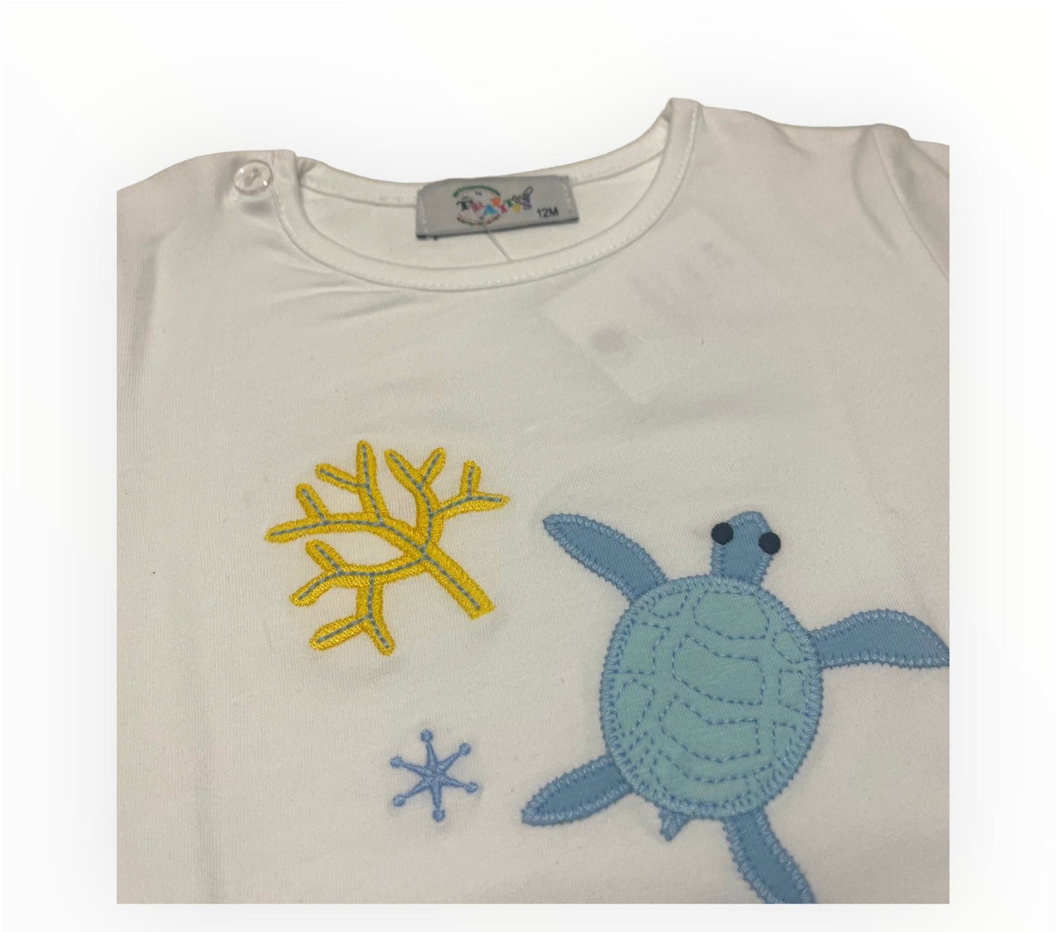 Comprar conjunto de baño para bebé niño. Estampado de tortugas. Detalle en camiseta de manga corta. Temporada primavera-verano. 