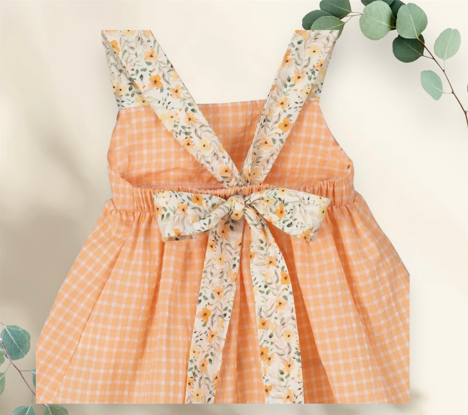 Comprar vestido Pimpinela de la marca Calamaro. Color mandarina. Vichy combinado con flores. Temporada primavera-verano.