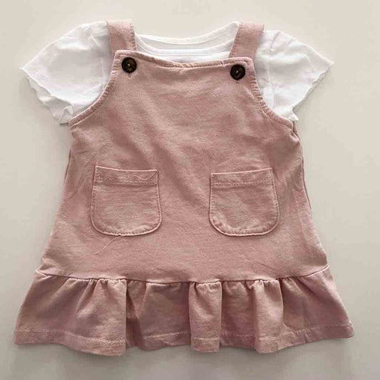Comprar conjunto de camiseta blanca y pichi para bebés niñas. Material algodón. Temporada Primavera Verano. Color rosa.
