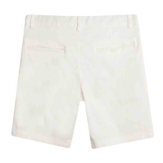 Detalle pantalón de conjunto infantil para niño. 2 piezas; camisa y bermudas. Primavera-Verano. Marca Newness. Color blanco y rosa.