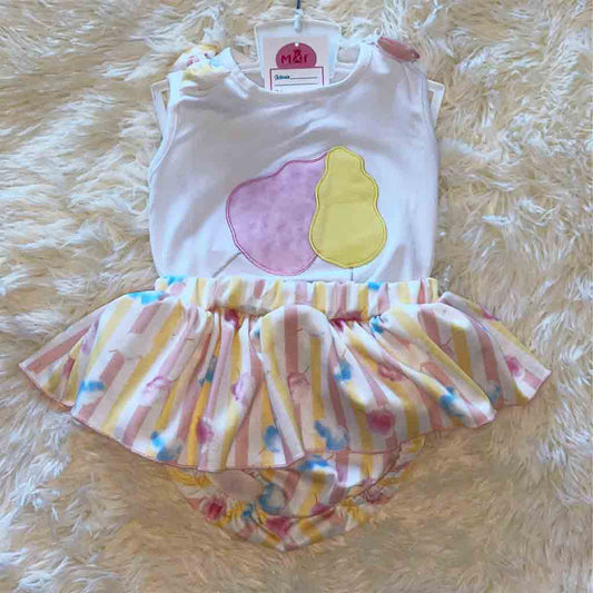Comprar conjunto divertido para bebé niña. Dos piezas; falda y camiseta. Primavera-Verano. Marca Petit Cle. Color blanco y multicolor.