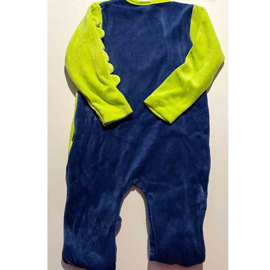 Parte trasera de pijama divertido de dinosaurio de invierno para bebé. Marca Yatsi. Color azul y verde.