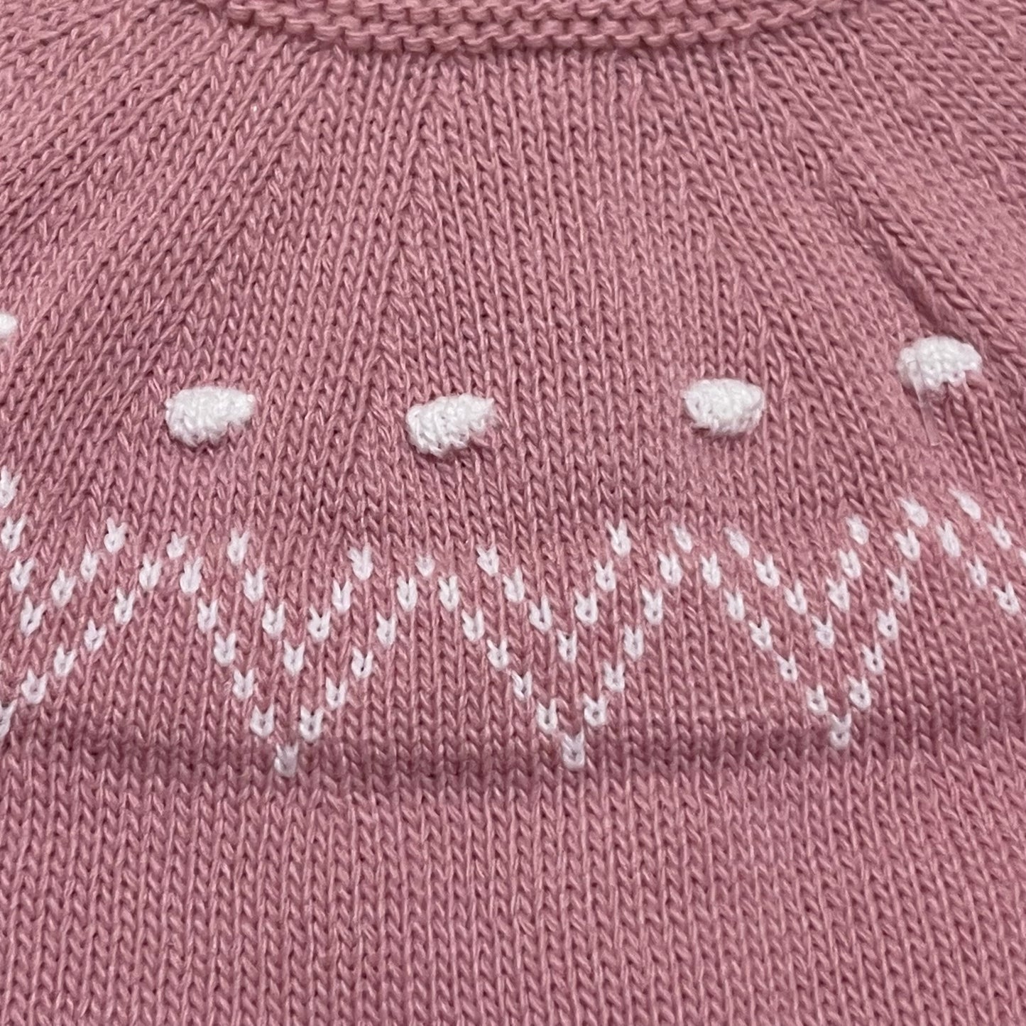 Comprar conjunto de primera puesta de lana. Color rosa maquillaje. Detalles en jersey. Temporada otoño/invierno.