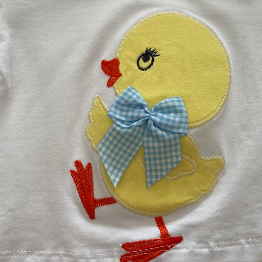 Comprar conjunto baño bebé niña. Camiseta con dibujo de pollito  y braguita. Color amarillo. Temporada Primavera-Verano.