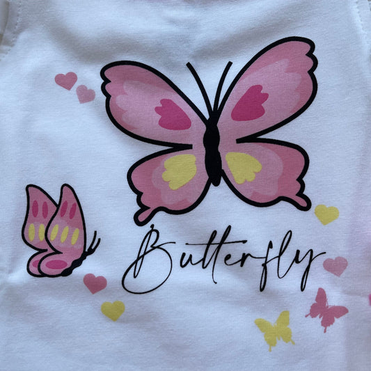 Comprar conjunto de niña de algodón. Detalle de mariposas en la camiseta. Color rosa. Marca Petit cie. 