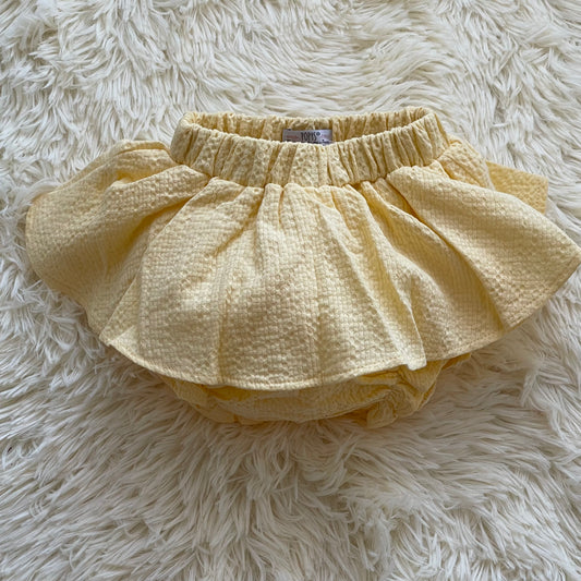 Comprar faldas cubrepañal para bebé niña. Color amarillo. Marca Confecciones Popys.