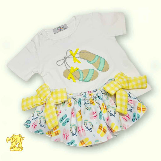 Comprar  conjunto para bebé niña con falda cubrepañal. Color amarillo. Temporada primavera-verano.